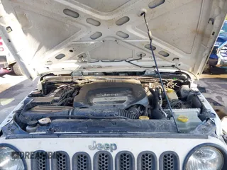 2016 Jeep Wrangler Unlimited Sport z VIN 1C4BJWDG5GL257423, wystawiony jako IAAI lot #42530026 z przebiegiem 157 072 mil mil oraz . Historia ofert i sprzedaży dostępna na DreamBid. Obrazek 10.