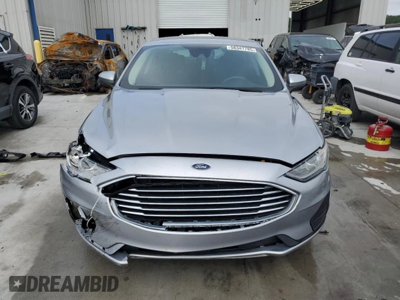2020 Ford Fusion SE with VIN 3FA6P0H71LR207241, listed as a Copart auction lot 58347785 with 92,375 mi miles and Salvage title. Bid and sale history available at DreamBid. Image 5.