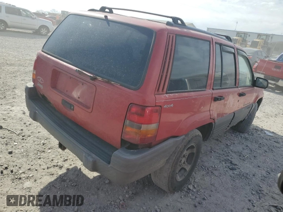 1997 Jeep Grand Cherokee Laredo with VIN 1J4GZ58S0VC501591, listed as a Copart auction lot 49289625 with 305,201 mi miles and Salvage Title. Bid and sale history available at carsss.com. Image 3.