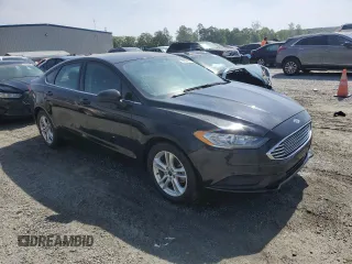 2018 Ford Fusion SE z VIN 3FA6P0HD9JR157594, wystawiony jako Copart lot #55539515 z przebiegiem 164 403 mil mil oraz Czysty tytuł • Clean title. Historia ofert i sprzedaży dostępna na DreamBid. Obrazek 4.
