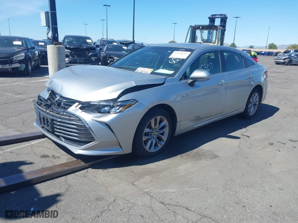 2019 Toyota Avalon Hybrid Limited with VIN 4T1B21FB1KU003112, listed as a IAAI auction lot 41610307 with 169,569 mi miles. Bid and sale history available at carsss.com. Image 2.