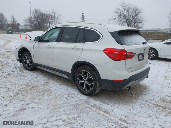 2018 BMW X1 xDrive28i with VIN WBXHT3C33J3H29973, listed as a IAAI auction lot 41547866 with 1 mi miles. Bid and sale history available at carsss.com. Image 3.