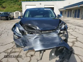 2022 Tesla Model Y Long Range z VIN 7SAYGDEE1NF430383, wystawiony jako Copart lot #56208825 z przebiegiem 60 612 mil mil oraz Szkoda całkowita • Salvage title. Historia ofert i sprzedaży dostępna na DreamBid. Obrazek 5.