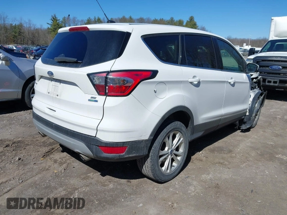 2017 Ford Escape SE with VIN 1FMCU9GD2HUE42101, listed as a IAAI auction lot 41898294 with 101,014 mi miles. Bid and sale history available at carsss.com. Image 4.