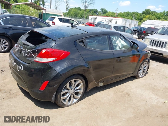 2013 Hyundai Veloster w/Black Int with VIN KMHTC6AD5DU164900, listed as a IAAI auction lot 36770576 with 106,253 mi miles and . Bid and sale history available at DreamBid. Image 4.
