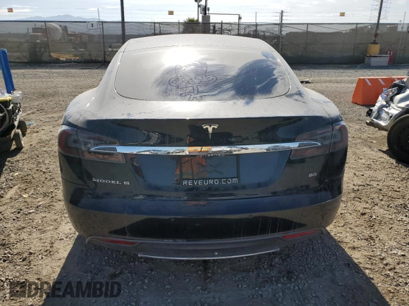 2014 Tesla Model S 60 with VIN 5YJSA1H13EFP38425, listed as a Copart auction lot 63686205 with 183,968 mi miles and Salvage title. Bid and sale history available at DreamBid. Image 6.
