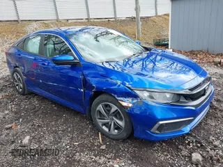 2020 Honda Civic LX z VIN 19XFC2F6XLE216507, wystawiony jako IAAI lot #41975250 z przebiegiem 58 864 mil mil oraz . Historia ofert i sprzedaży dostępna na DreamBid. Obrazek 1.
