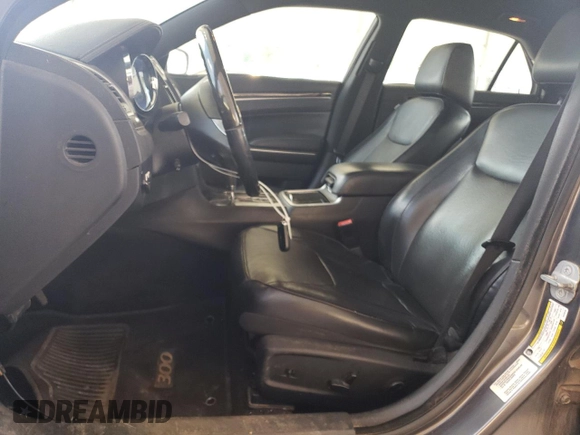 2014 Chrysler 300 C with VIN 2C3CCAKT7EH290150, listed as a Copart auction lot 73772864 with 162,952 mi miles and Salvage Title. Bid and sale history available at DreamBid. Image 7.