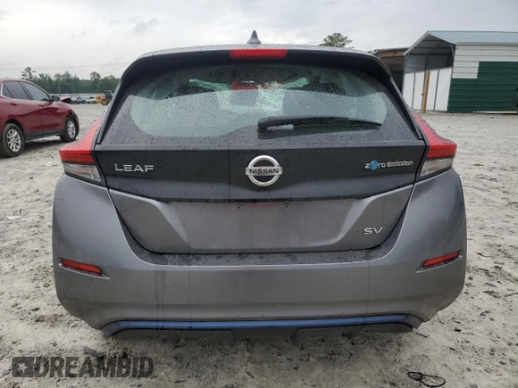 2018 Nissan LEAF SV with VIN 1N4AZ1CP1JC307031, listed as a Copart auction lot 58869215 with 99,621 mi miles and Salvage title. Bid and sale history available at DreamBid. Image 6.