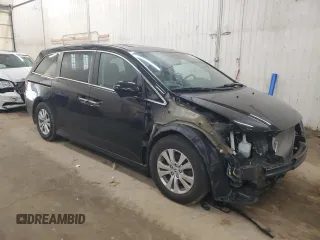 2015 Honda Odyssey EX-L with VIN 5FNRL5H62FB014772, listed as a Copart auction lot 55088925 with 144,152 mi miles and Salvage Title. Bid and sale history available at DreamBid. Image 4.
