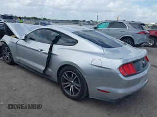 2016 Ford Mustang EcoBoost z VIN 1FA6P8TH5G5305096, wystawiony jako IAAI lot #41908211 z przebiegiem 106 585 mil mil oraz . Historia ofert i sprzedaży dostępna na DreamBid. Obrazek 3.