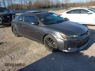 2014 Scion tC with VIN JTKJF5C74E3083312, listed as a IAAI auction lot 41730086 with 118,124 mi miles. Bid and sale history available at carsss.com. Image 1.