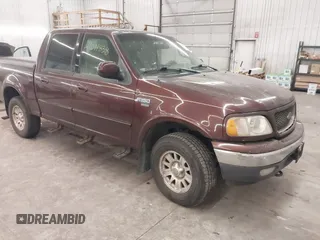 2001 Ford F-150 SuperCrew XLT with VIN 1FTRW08L51KE26356, listed as a IAAI auction lot 41011838 with 1 mi miles. Bid and sale history available at carsss.com. Image 1.