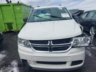 2018 Dodge Journey SE with VIN 3C4PDCAB1JT295988, listed as a IAAI auction lot 41226385 with 106,639 mi miles. Bid and sale history available at carsss.com. Image 12.