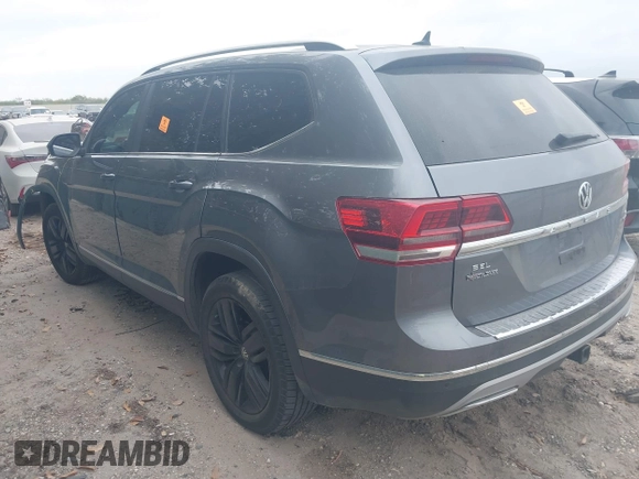 2019 Volkswagen Atlas SEL with VIN 1V2MR2CAXKC606820, listed as a IAAI auction lot 41174864 with 157,416 mi miles and . Bid and sale history available at DreamBid. Image 3.
