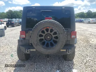 2015 Jeep Wrangler Unlimited Rubicon z VIN 1C4BJWFG2FL530863, wystawiony jako Copart lot #56345965 z przebiegiem 149 754 mil mil oraz Szkoda całkowita • Salvage title. Historia ofert i sprzedaży dostępna na DreamBid. Obrazek 6.