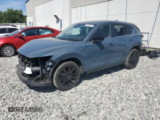 2023 Mazda CX-5 2.5 S Preferred Package with VIN JM3KFBCM1P0145003, listed as a Copart auction lot 51909105 with 9,057 mi miles and Salvage Title. Bid and sale history available at carsss.com. Image 1.