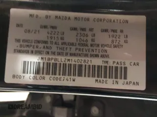 2021 Mazda Mazda3 Hatchback Preferred with VIN JM1BPBLL2M1402821, listed as a IAAI auction lot 41068897 with 75,271 mi miles. Bid and sale history available at carsss.com. Image 9.