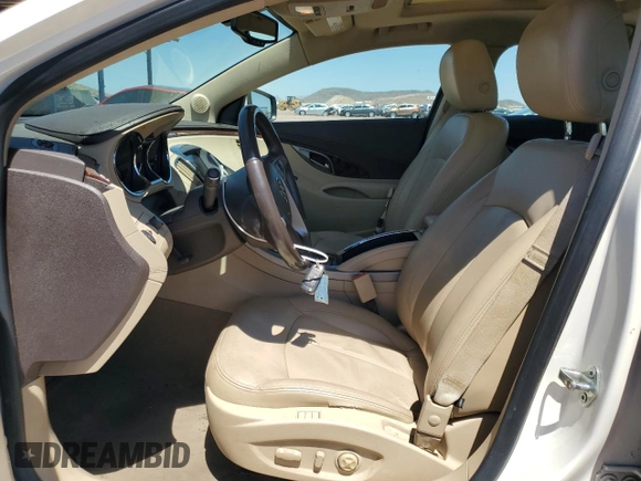 2012 Buick LaCrosse Premium 1 z VIN 1G4GD5ER3CF275477, wystawiony jako Copart lot #61025545 z przebiegiem 139 252 mil mil oraz Szkoda całkowita • Salvage title. Historia ofert i sprzedaży dostępna na DreamBid. Obrazek 7.