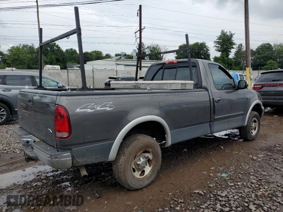 2002 Ford F-150 XL z VIN 2FTRF18W52CA50943, wystawiony jako Copart lot #62456605 z przebiegiem Nie podano mil oraz Szkoda całkowita • Salvage title. Historia ofert i sprzedaży dostępna na DreamBid. Obrazek 3.
