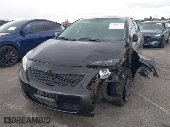 2010 Toyota Corolla with VIN 1NXBU4EE5AZ313365, listed as a IAAI auction lot 41791466 with 125,359 mi miles and . Bid and sale history available at DreamBid. Image 17.
