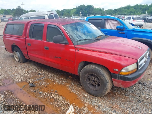 2000 Dodge Dakota Sport with VIN 1B7GL2AN7YS607119, listed as a IAAI auction lot 42377808 with 287,892 mi miles and . Bid and sale history available at DreamBid. Image 1.