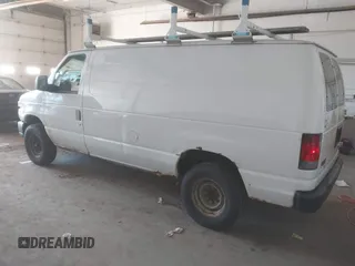 2011 Ford Econoline Cargo Commercial with VIN 1FTNE2EW9BDB11058, listed as a IAAI auction lot 42202069 with 282,179 mi miles. Bid and sale history available at carsss.com. Image 3.