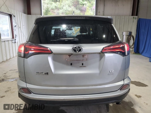 2018 Toyota RAV4 LE with VIN 2T3BFREV0JW781650, listed as a Copart auction lot 52123085 with 36,748 mi miles and Salvage Title. Bid and sale history available at carsss.com. Image 6.