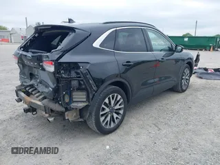 2020 Ford Escape Titanium with VIN 1FMCU9J97LUA35212, listed as a IAAI auction lot 42347274 with 50,419 mi miles and . Bid and sale history available at DreamBid. Image 4.