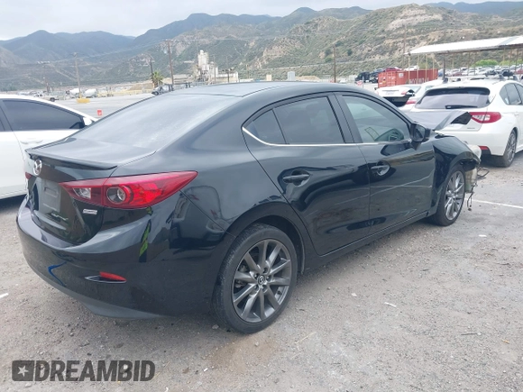 2018 Mazda 3 Touring with VIN 3MZBN1V30JM201671, listed as a IAAI auction lot 42189105 with 174,284 mi miles and . Bid and sale history available at carsss.com. Image 4.