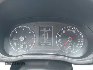 2013 Volkswagen Passat SE z VIN 1VWBN7A30DC056730, wystawiony jako IAAI lot #42542464 z przebiegiem 190 608 mil mil oraz . Historia ofert i sprzedaży dostępna na DreamBid. Obrazek 7.