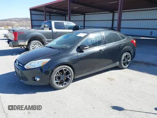 2014 Ford Focus SE with VIN 1FADP3F23EL355117, listed as a IAAI auction lot 41771824 with 211,052 mi miles. Bid and sale history available at carsss.com. Image 2.