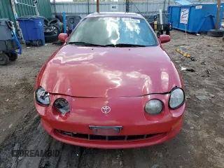 1995 Toyota Celica ST z VIN JT2AT00N7S0042443, wystawiony jako Copart lot #56394475 z przebiegiem 328 515 mil mil oraz Szkody całkowita. Historia ofert i sprzedaży dostępna na DreamBid. Obrazek 5.