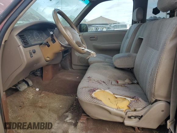 1996 Toyota T100 DX with VIN JT4TN12D0T0021827, listed as a Copart auction lot 44328465 with 253,582 mi miles and Salvage Title. Bid and sale history available at carsss.com. Image 7.