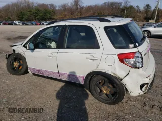2012 Suzuki SX4 Crossover with VIN JS2YB5A32C6303887, listed as a Copart auction lot 82214144 with 0 mi miles and Salvage Title. Bid and sale history available at carsss.com. Image 2.