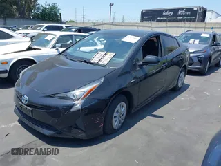2016 Toyota Prius Two z VIN JTDKBRFU5G3014163, wystawiony jako IAAI lot #42475556 z przebiegiem 157 873 mil mil oraz . Historia ofert i sprzedaży dostępna na DreamBid. Obrazek 19.