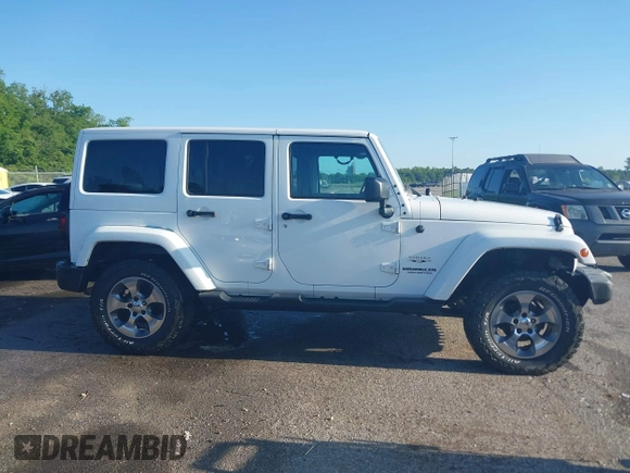 2016 Jeep Wrangler Unlimited 75th Anniversary z VIN 1C4BJWEG1GL250449, wystawiony jako IAAI lot #42204012 z przebiegiem 180 173 mil mil oraz . Historia ofert i sprzedaży dostępna na DreamBid. Obrazek 13.