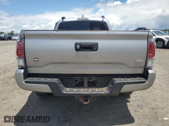 2020 Toyota Tacoma SR5 with VIN 3TMDZ5BN5LM090020, listed as a Copart auction lot 58192835 with 107,156 mi miles and Salvage title. Bid and sale history available at DreamBid. Image 6.