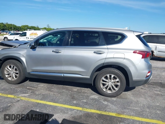 2020 Hyundai Santa Fe SEL with VIN 5NMS3CAD5LH218667, listed as a IAAI auction lot 41025347 with 81,632 mi miles and . Bid and sale history available at DreamBid. Image 14.