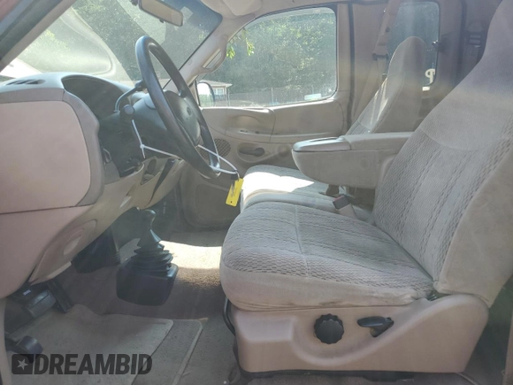 1998 Ford F-150 with VIN 1FTZX18W8WNB76999, listed as a Copart auction lot 59845595 with 135,063 mi miles and Salvage title. Bid and sale history available at DreamBid. Image 7.