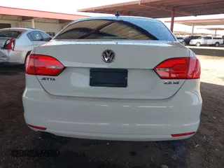 2013 Volkswagen Jetta SE z VIN 3VWDP7AJ5DM374598, wystawiony jako IAAI lot #42498082 z przebiegiem 144 285 mil mil oraz . Historia ofert i sprzedaży dostępna na DreamBid. Obrazek 16.