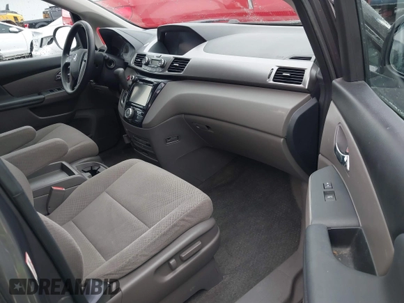 2017 Honda Odyssey SE with VIN 5FNRL5H34HB009081, listed as a IAAI auction lot 41701429 with 72,131 mi miles and . Bid and sale history available at carsss.com. Image 5.