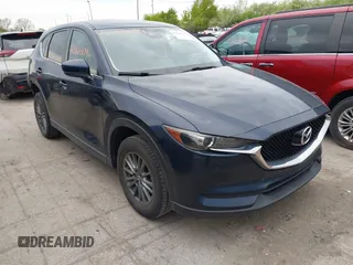 2017 Mazda CX-5 Touring with VIN JM3KFBCL2H0213740, listed as a IAAI auction lot 42165094 with 112,240 mi miles and . Bid and sale history available at DreamBid. Image 1.