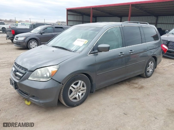 2007 Honda Odyssey EX-L with VIN 5FNRL386X7B423012, listed as a IAAI auction lot 41876854 with 266,588 mi miles. Bid and sale history available at carsss.com. Image 2.