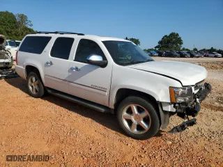 2014 Chevrolet Suburban LTZ with VIN 1GNSCKE06ER208821, listed as a Copart auction lot 70534924 with 81,098 mi miles and Salvage Title. Bid and sale history available at carsss.com. Image 4.
