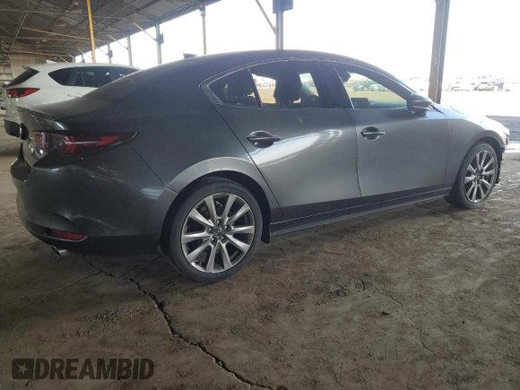 2021 Mazda 3 Premium with VIN JM1BPADL1M1305537, listed as a Copart auction lot 50722545 with 66,182 mi miles and Salvage title. Bid and sale history available at DreamBid. Image 3.
