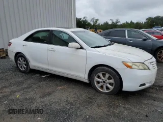 2008 Toyota Camry LE z VIN 4T1BE46K28U730356, wystawiony jako Copart lot #71500284 z przebiegiem 221 011 mil mil oraz Czysty tytuł • Clean title. Historia ofert i sprzedaży dostępna na DreamBid. Obrazek 4.