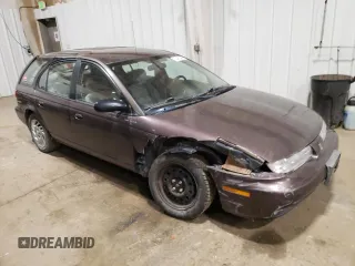 1998 Saturn SW z VIN 1G8ZK8271WZ165967, wystawiony jako Copart lot #73493044 z przebiegiem Nie podano mil oraz Szkody całkowita. Historia ofert i sprzedaży dostępna na DreamBid. Obrazek 4.