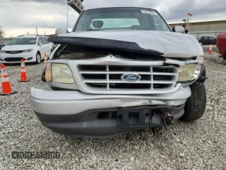 2002 Ford F-150 XL with VIN 1FTRX17232NB46169, listed as a Copart auction lot 49477685 with 182,508 mi miles and Salvage Title. Bid and sale history available at carsss.com. Image 5.