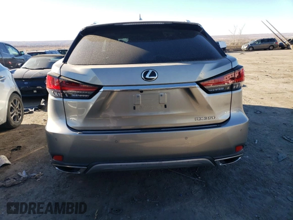 2022 Lexus RX with VIN 2T2JZMAA7NC257707, listed as a Copart auction lot 83791524 with 31,965 mi miles and Salvage Title. Bid and sale history available at carsss.com. Image 6.